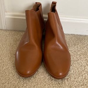 Brown leather Micheal kors mini boots with slight heels.  Brand new, size 7.5